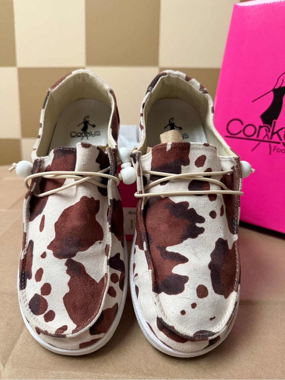 Corkys Woman’s Cowprint Moccasins in Brown and Cream